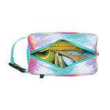 A rectangular zippered pouch with a pastel tie-dye pattern in blue, pink, purple, and orange, shown open to reveal its contents, including a chocolate banana granola bar and wooden utensils, on a white background.