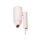 Pink lip gloss applicator with a small amount of red lipstick on a white background