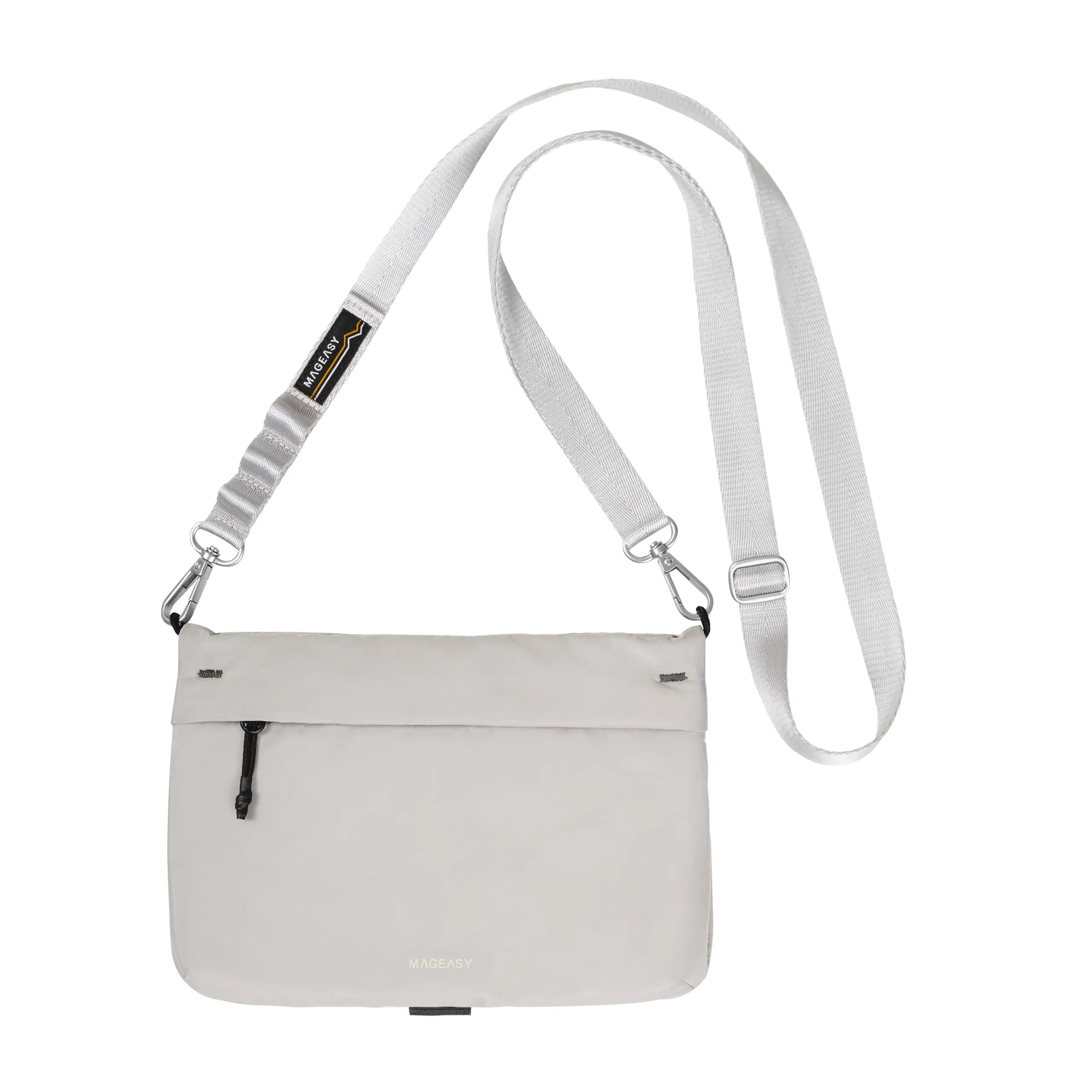 A light gray crossbody bag with a matching adjustable shoulder strap, featuring a zippered front pocket and a small black and yellow brand tag.