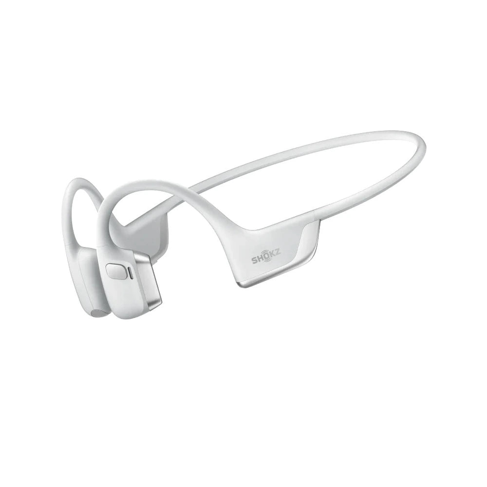 White bone conduction wireless earplugs with a curved headband design, featuring a visible 'SHOK' brand logo on the temple arm, set against a solid white background.